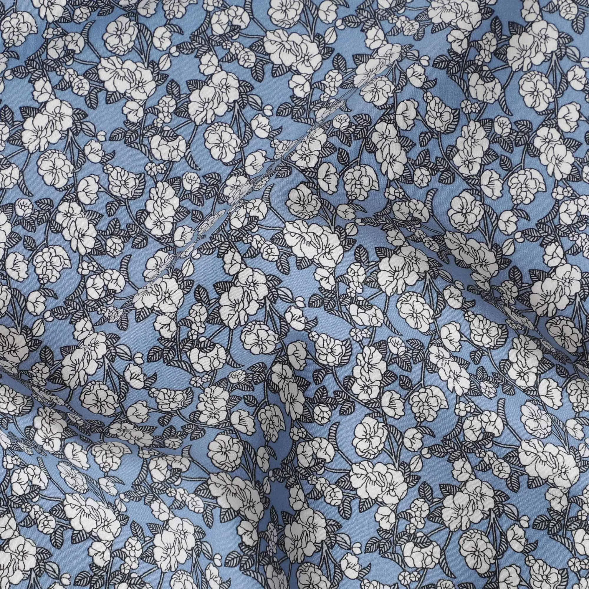 Baby blue cotton fabric with white and black print in floral design-D14844