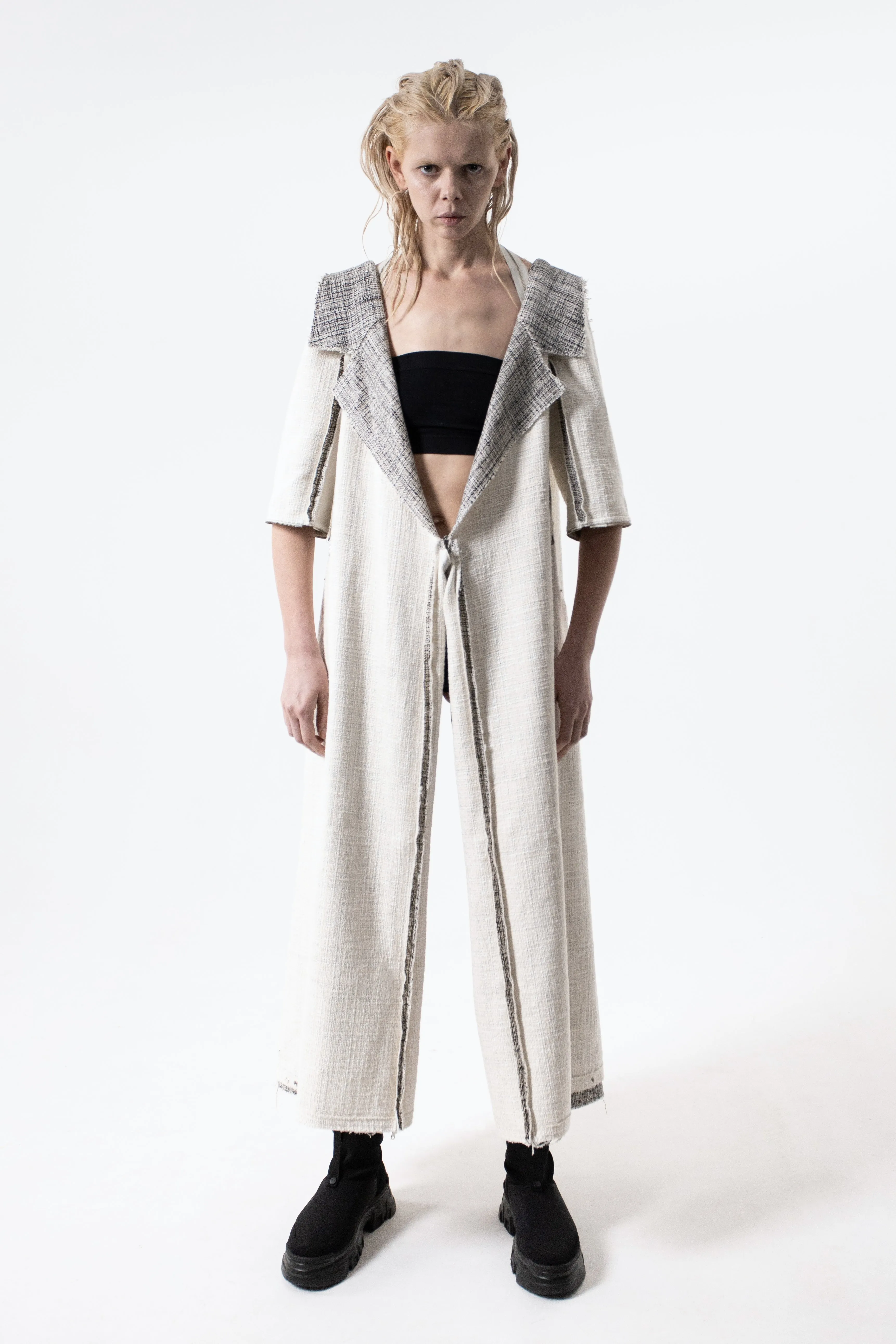 DUALITY 10-way transforming piece: coat / jumpsuit / vest / dress / 4 bags