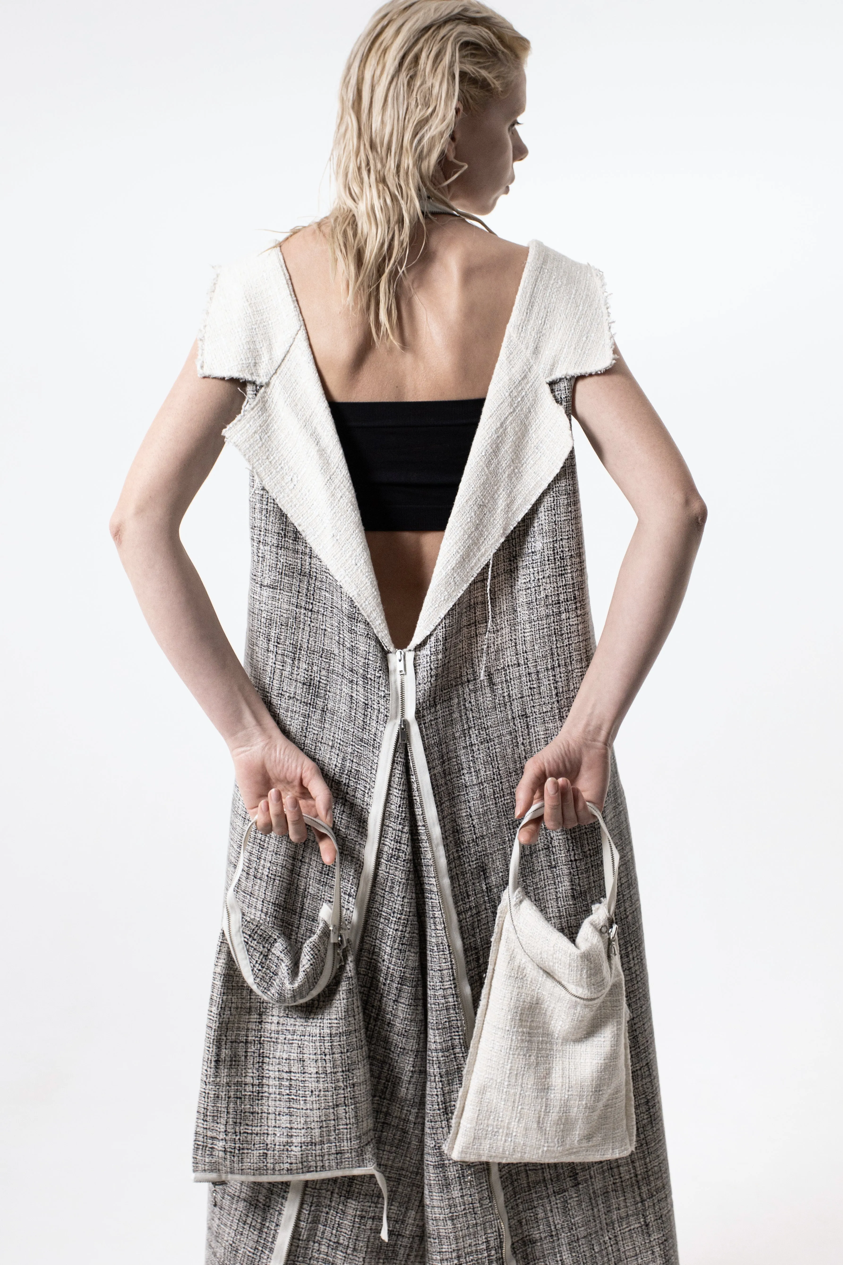 DUALITY 10-way transforming piece: coat / jumpsuit / vest / dress / 4 bags